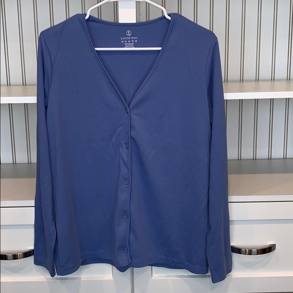 Women’s cotton button down shirt.